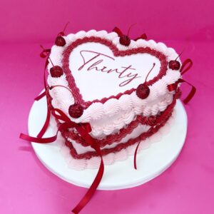 Pink Lambeth Cake with cherries