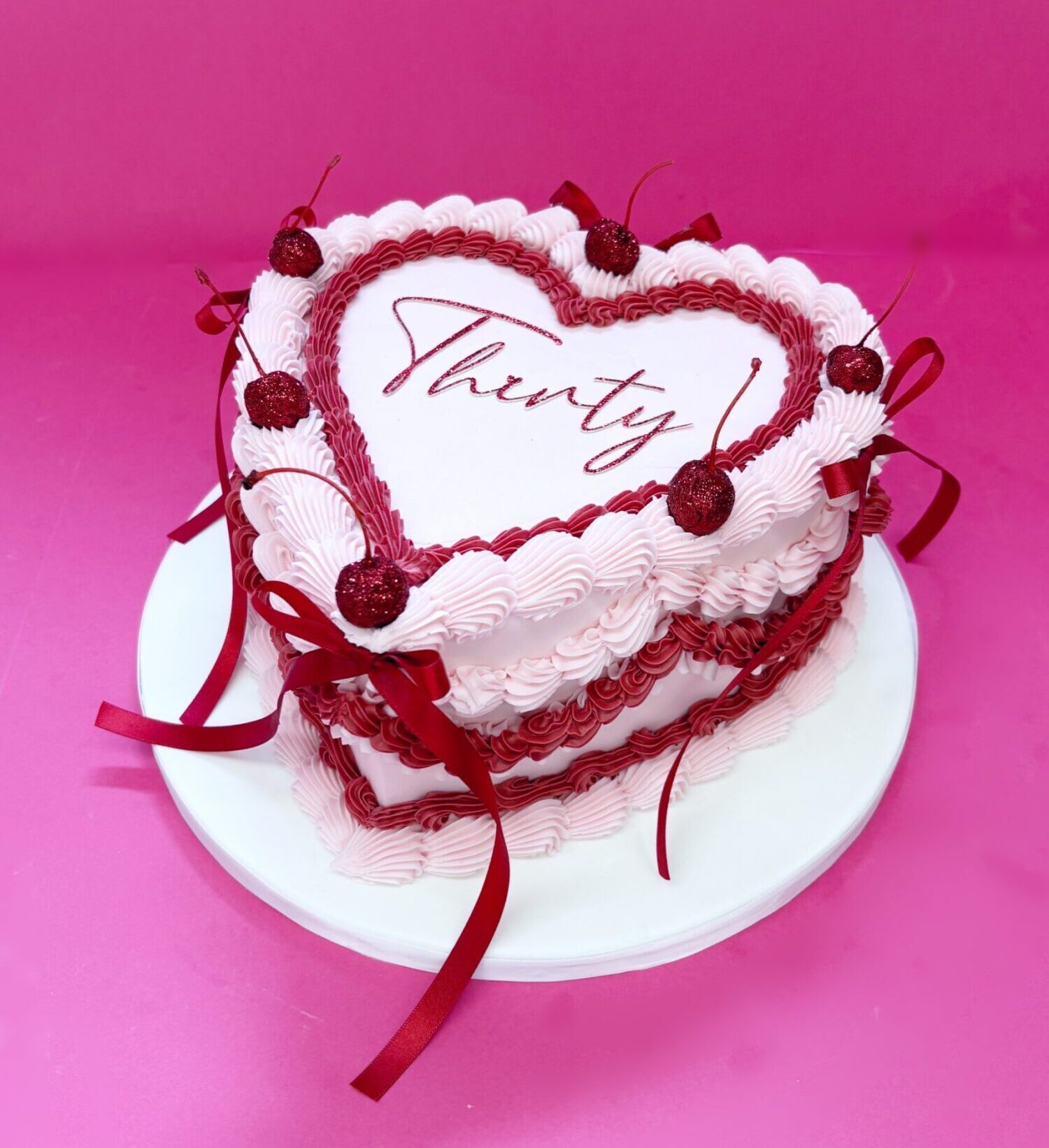 Pink Lambeth Cake with cherries